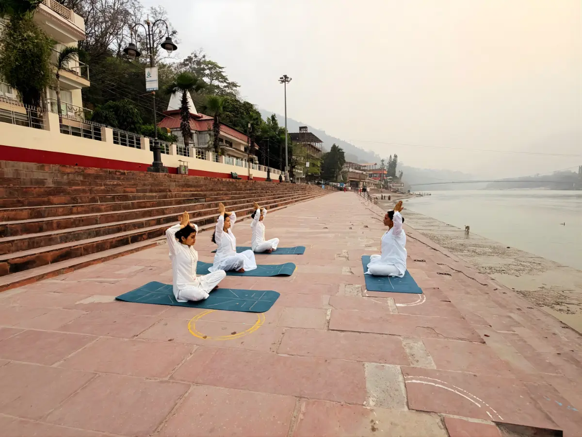 Yoga in Rishikesh near river Ganga and Ramjhula