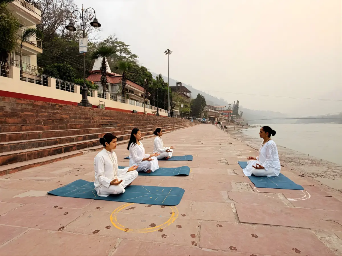 Yoga in Rishikesh near river Ganga and Ramjhula