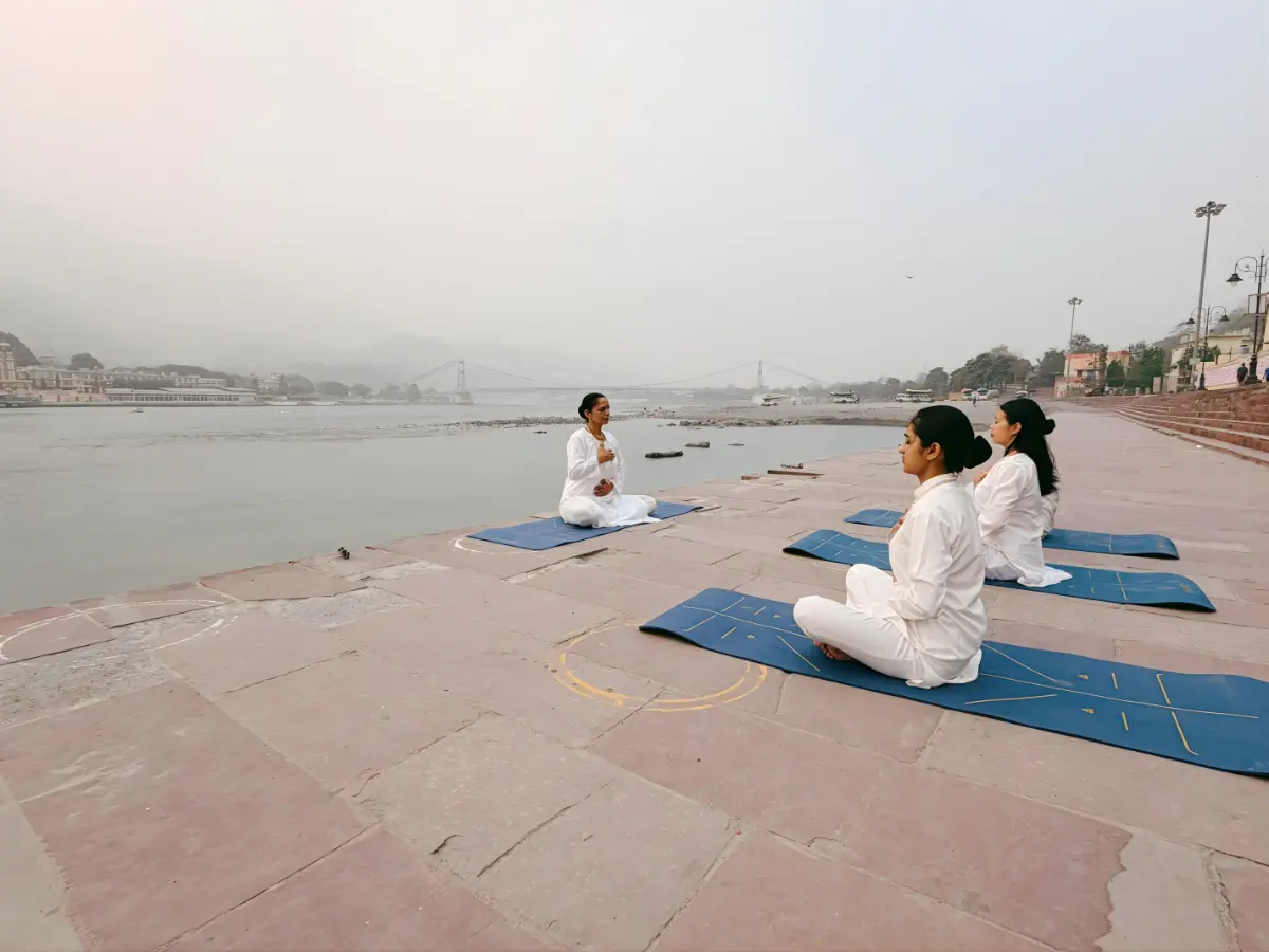 Yoga in Rishikesh near river Ganga and Ramjhula